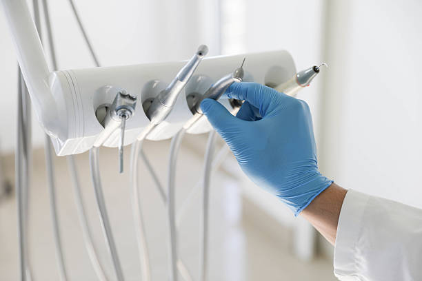 Professional Invisalign Clear Aligners technician working in Malta, IL